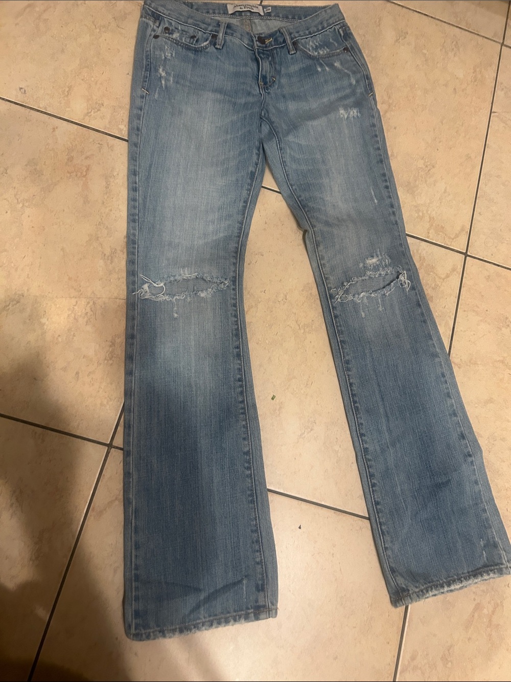 Abercrombie & Fitch “Emma” Y2K distressed low rise bootcut denim jeans.